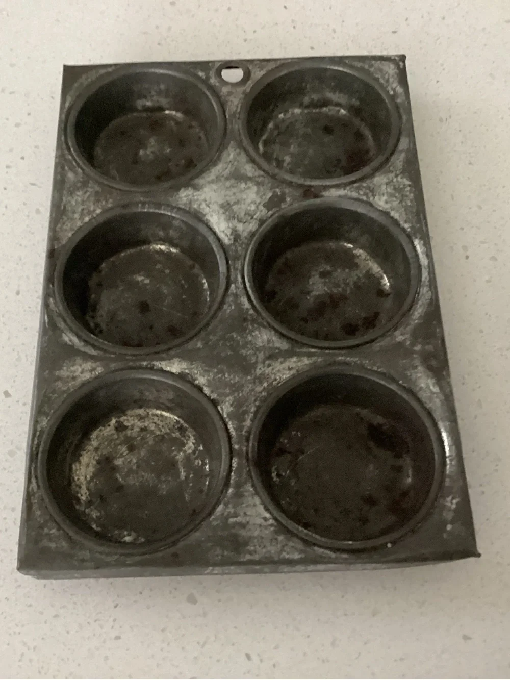 Vtg. Children’s toy muffin tin or miniature salesmen sample. Hole to hang